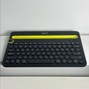 Logitech Wireless Keyboard with Black and Yellow Design takes 2 x AAA batteries